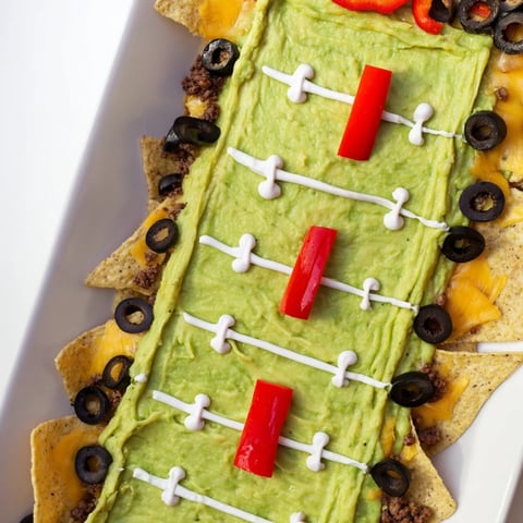 Here are three ALT texts for the "Soccer Field Nacho Platter":